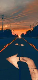 Sunset road with glowing horizon under a dramatic sky.