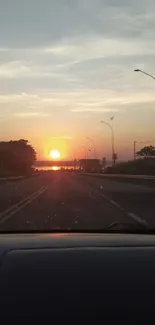 A serene sunset view from a road trip.