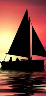 Silhouette of sailboat at sunset reflecting on tranquil waters.