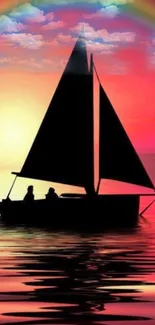 Silhouette of a sailboat against a colorful sunset with a rainbow and pink sky.