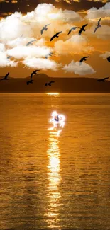 Serene sunset over water with birds in flight.