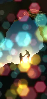 Couple silhouetted underneath a rock arch during sunset.