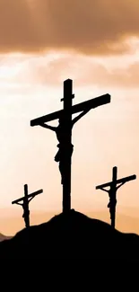 Silhouetted crosses against a vibrant sunset sky, evoking peace and spirituality.