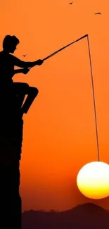 Silhouette of a fisherman against a vibrant orange sunset, creating captivating art.