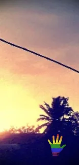 Silhouette of palms at sunset with colorful sky.