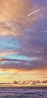 Vibrant sunset over ocean, featuring colorful clouds and a shooting star in the sky.