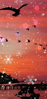 Sunset sky with birds, stars, and snowflakes mobile wallpaper.