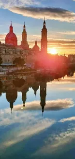 City skyline reflected in sunset-lit water.