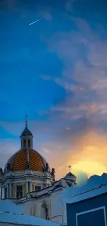 Beautiful sunset skyline with a dome silhouetted against vibrant clouds.