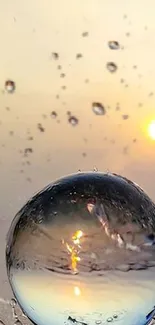 Sunset reflecting in a clear sphere with water droplets, enhancing serenity.