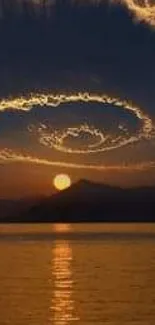 Dramatic sunset spiral through clouds over a calm reflective sea.