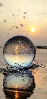 Crystal ball with sunset reflection and splashing water on a serene background.