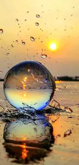 Sunset reflection in a crystal sphere with splashing water.