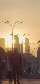 Silhouetted figures stroll through an urban street at sunset with a glowing skyline.