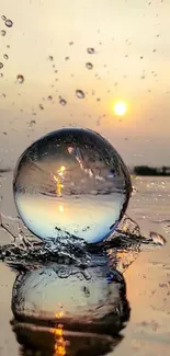 Sunset over water with reflective sphere and splashing drops.