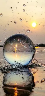 Reflective water sphere with sunset backdrop, creating a serene and artistic mobile wallpaper.