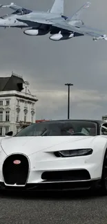 Supercar on road with jet overhead in city background.