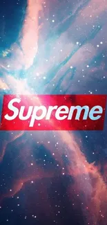 Supreme logo on cosmic blue wallpaper with nebula.