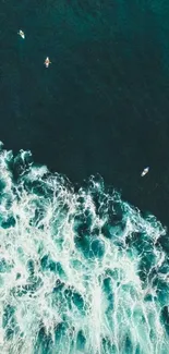 Surfers navigating turquoise waves in ocean landscape wallpaper.