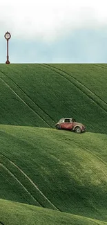 Surreal landscape with vintage car on green hills and a clock tower.