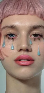 Portrait with pink hair and blue tear-like makeup drops.