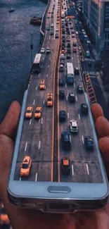 Surreal image of a smartphone with a highway extending from the screen.