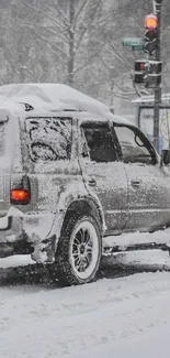 SUV driving through a snowy winter landscape.