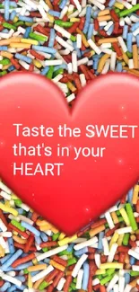 Red heart on colorful sprinkles background with playful quote.