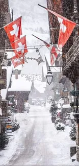 Snowy Swiss village street with red flags fluttering.