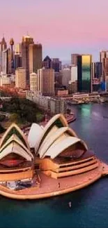 Aerial view of Sydney Harbor and Opera House at sunrise.