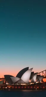 Sydney Opera House under starry night sky with bridge and vibrant sunset.