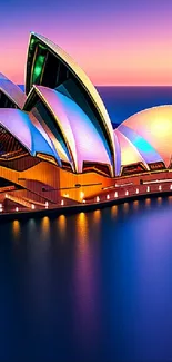 Colorful Sydney Opera House at sunset reflecting over water, vibrant hues.