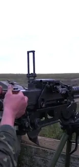 A tactical heavy machine gun in an outdoor setting, highlighting military readiness.