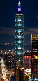 Taipei 101 tower illuminated in a vibrant night cityscape.