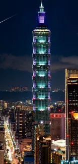 Taipei 101 skyscraper brightly lit at night showcasing the city's skyline.