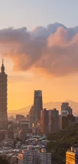 Taipei skyline at sunset with Taipei 101 against a golden sky.