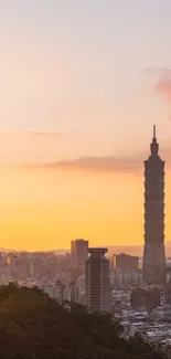 Taipei skyline at sunset with Taipei 101 silhouette and warm orange sky.