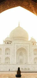 Sunrise view of Taj Mahal with warm light.