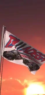 Talladega Superspeedway flag against a sunset backdrop.