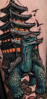 Mystical turtle tattoo with a pagoda on its back, vibrant teal design.