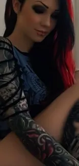 Portrait of a tattooed woman with dark hair and artistic design.
