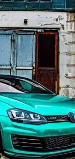 Teal car in front of urban building, capturing a sleek city vibe.