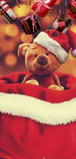 Teddy bear in Santa hat surrounded by Christmas gifts.