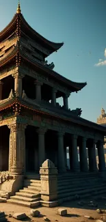 Sunlit ancient temple amidst ruins capturing a serene golden hour glow.