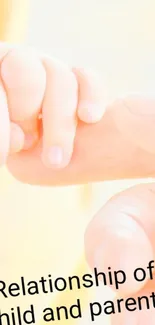 Child's hand gently holding a parent's finger, symbolizing love.