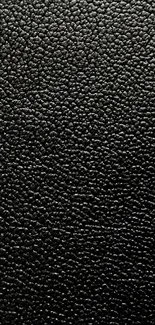 Textured black wallpaper for mobile screen.
