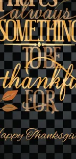 Thanksgiving wallpaper with gratitude message on a black and orange background.