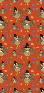 Thanksgiving turkey pattern with colorful leaves on orange background.