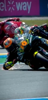 Motorcyclists racing at high speed on track with sharp turns.