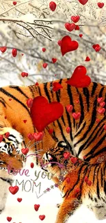 Tiger with hearts in snowy landscape wallpaper.